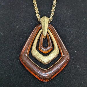 Vintage Avon Town & Country Rootbeer Swirl Lucite Pendant Gold Tone Chain 1974